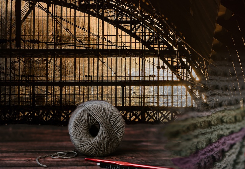A composite image of a ball of yarn and a crochet hook superimposed over a factory